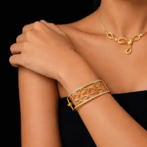 New Ganesha 22K Gold Floral Bangle with petal design and stone accents – 18.880g