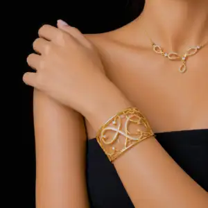 New Ganesha Aurelia Vine 22K Gold Bangle with leaf design and sparkling stone accents – 17.870g